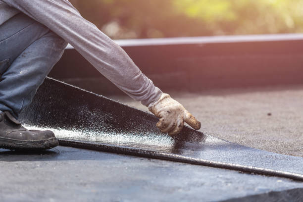 Professional Waterproofing technician working in Fulton, NY